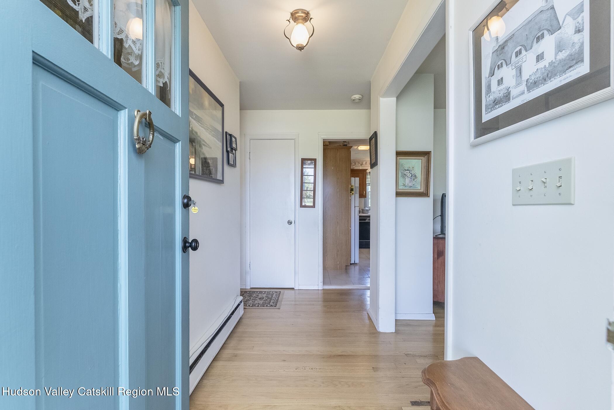 70 Ringtop Road Kingston, NY 12401 - Photo 2 of 47 a view of a hallway with wooden floor and entryway