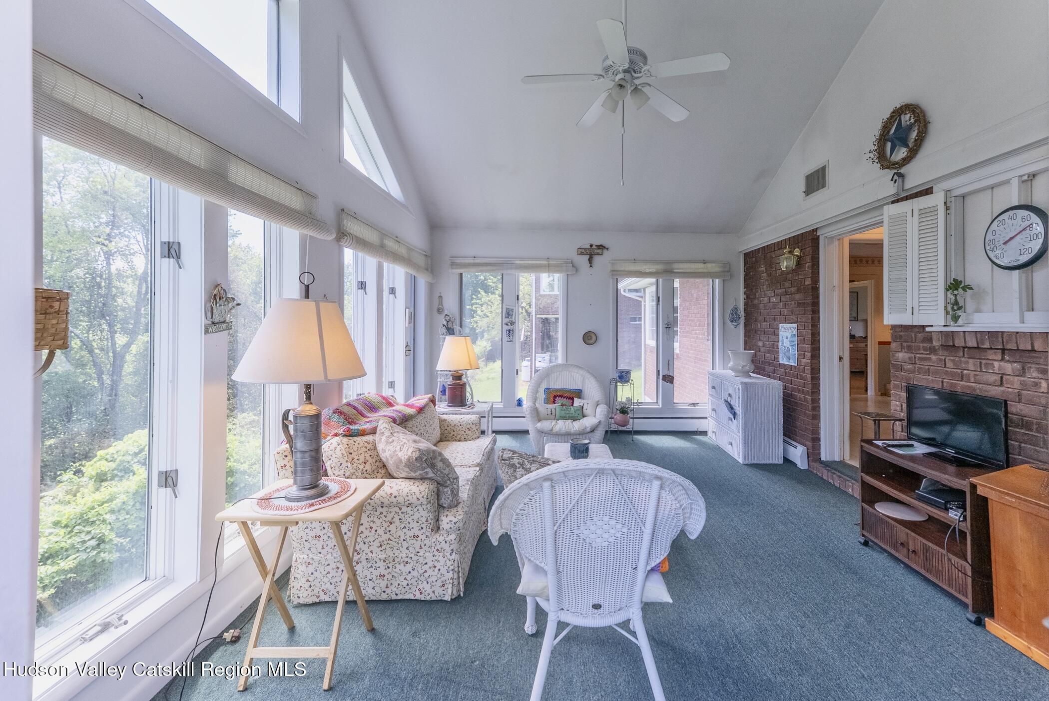 70 Ringtop Road Kingston, NY 12401 - Photo 22 of 47 a living room with fireplace furniture and a large window