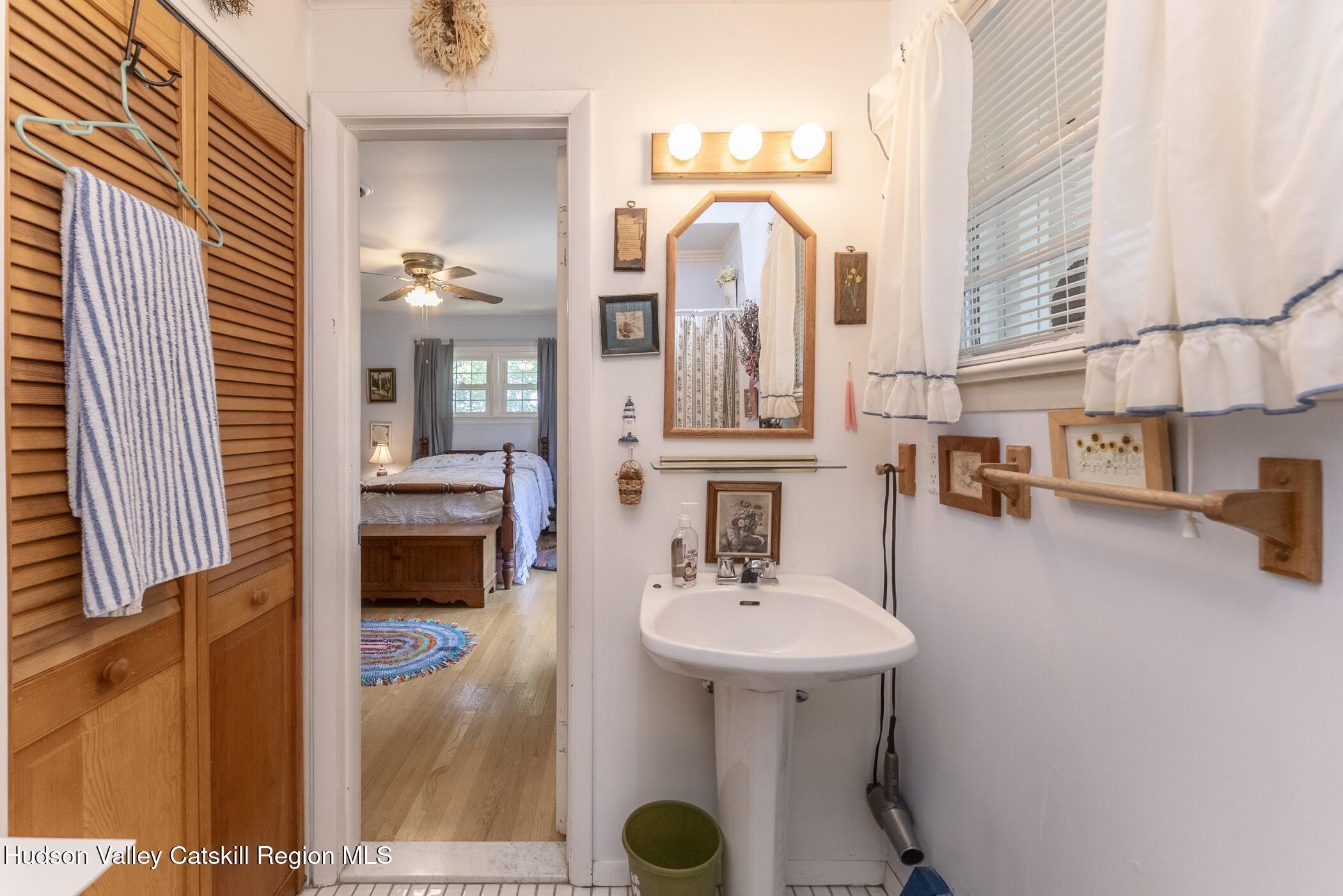 70 Ringtop Road Kingston, NY 12401 - Photo 27 of 47 a bathroom with a sink and a mirror