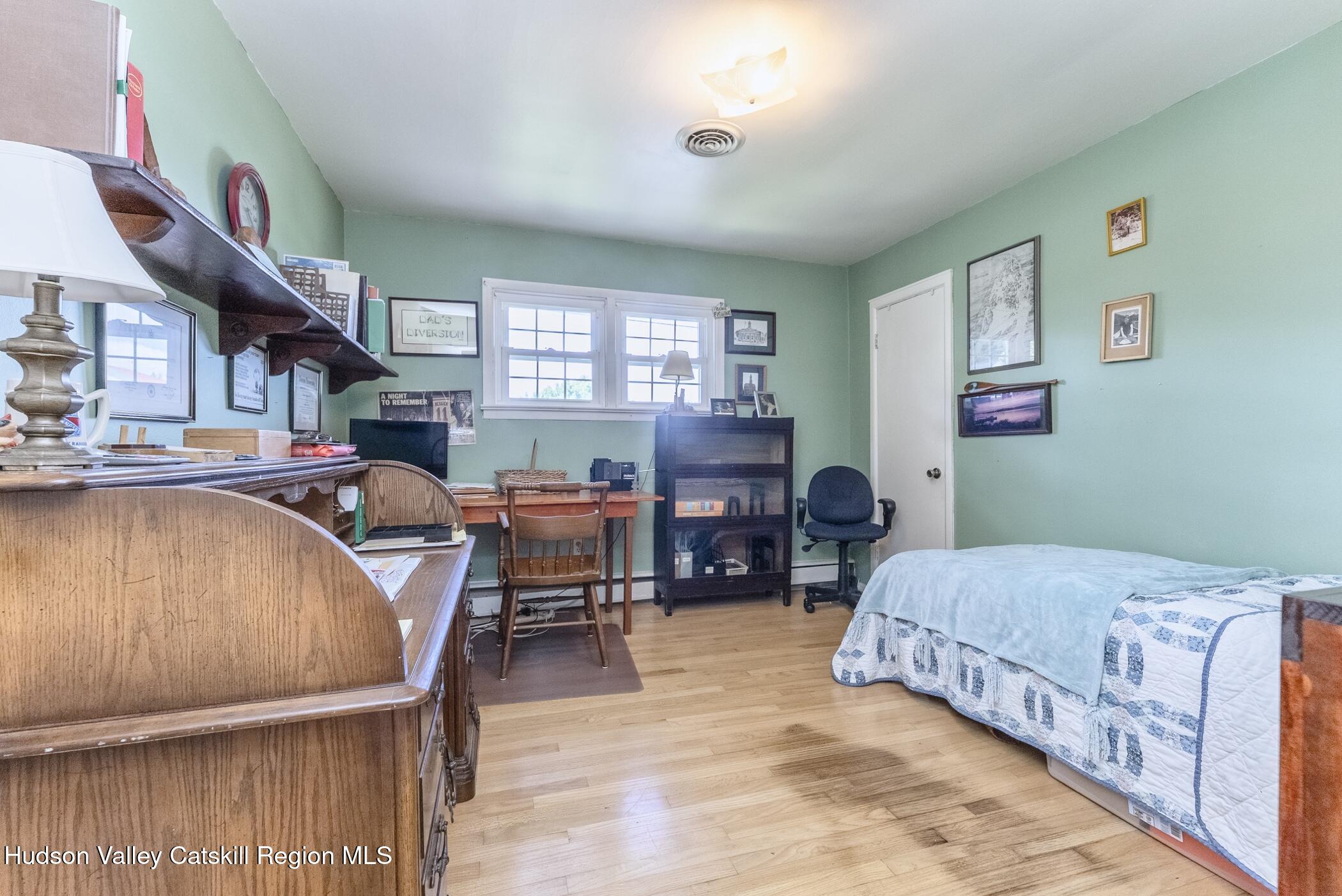 70 Ringtop Road Kingston, NY 12401 - Photo 33 of 47 a living room with furniture and a dining area