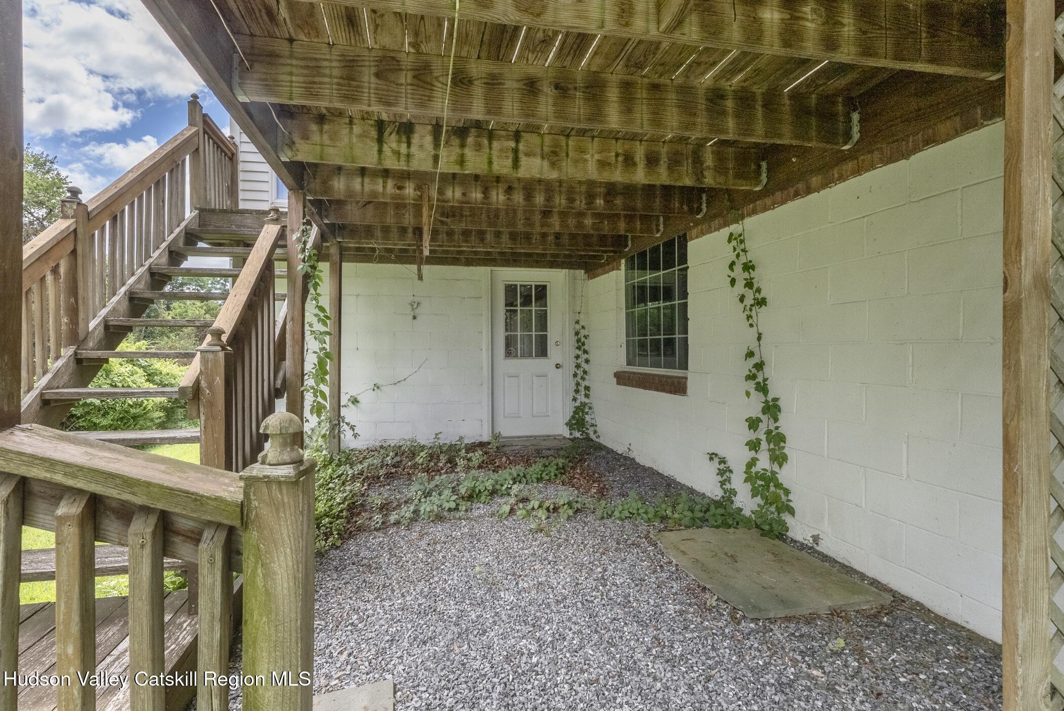 70 Ringtop Road Kingston, NY 12401 - Photo 38 of 47 a front view of a house with wooden stairs