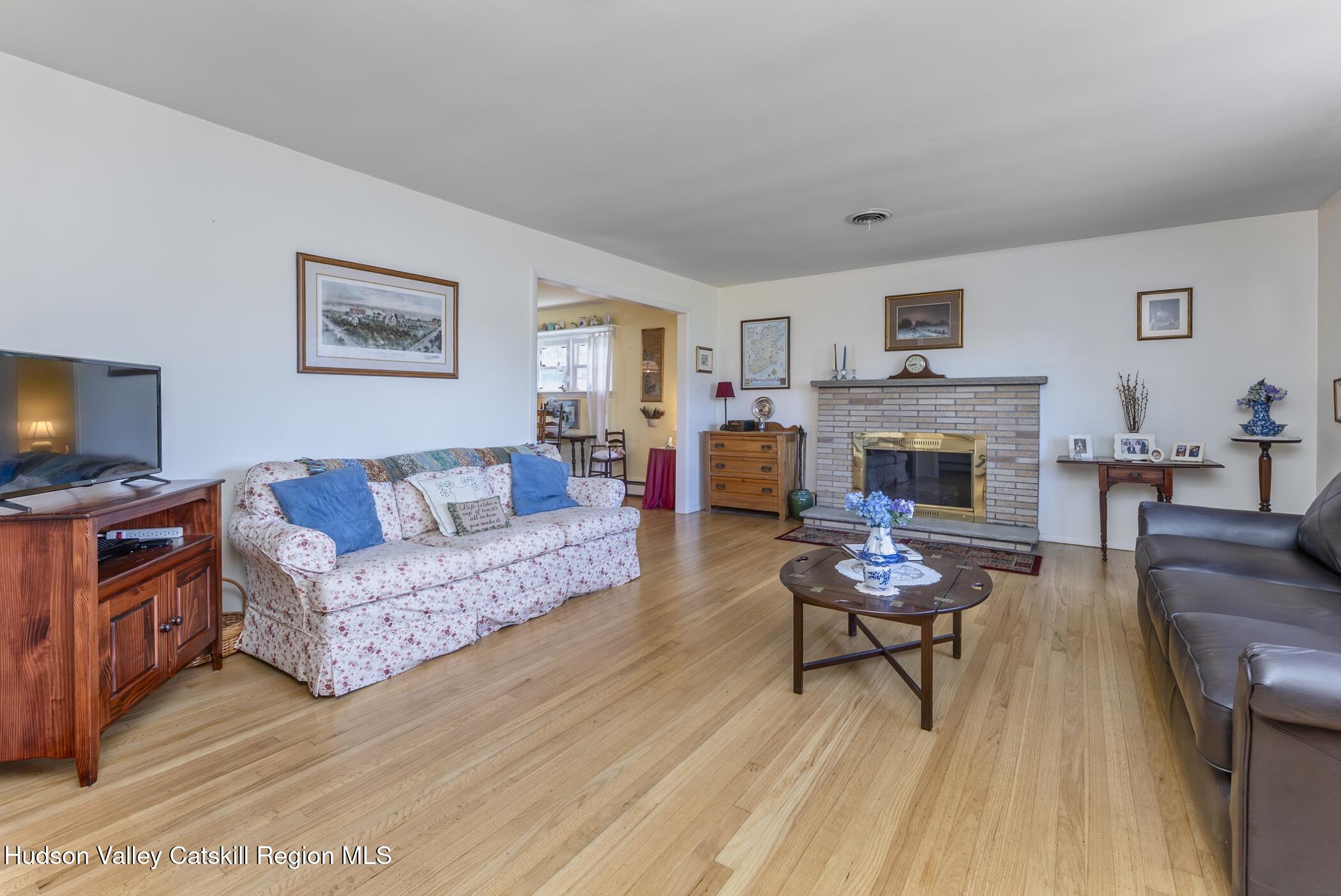 70 Ringtop Road Kingston, NY 12401 - Photo 4 of 47 a living room with furniture and a fireplace