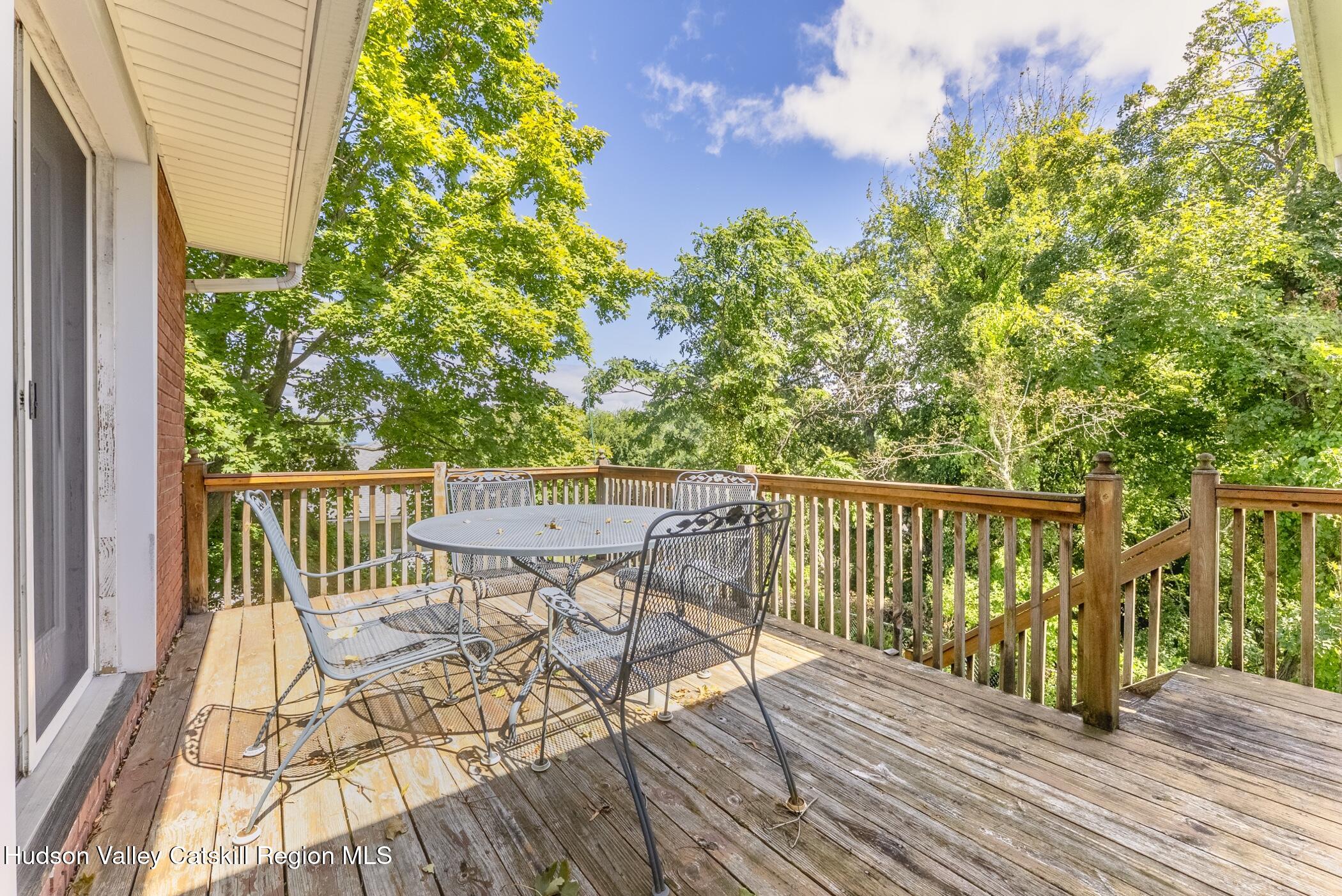 70 Ringtop Road Kingston, NY 12401 - Photo 41 of 47 a view of balcony with wooden floor and seating