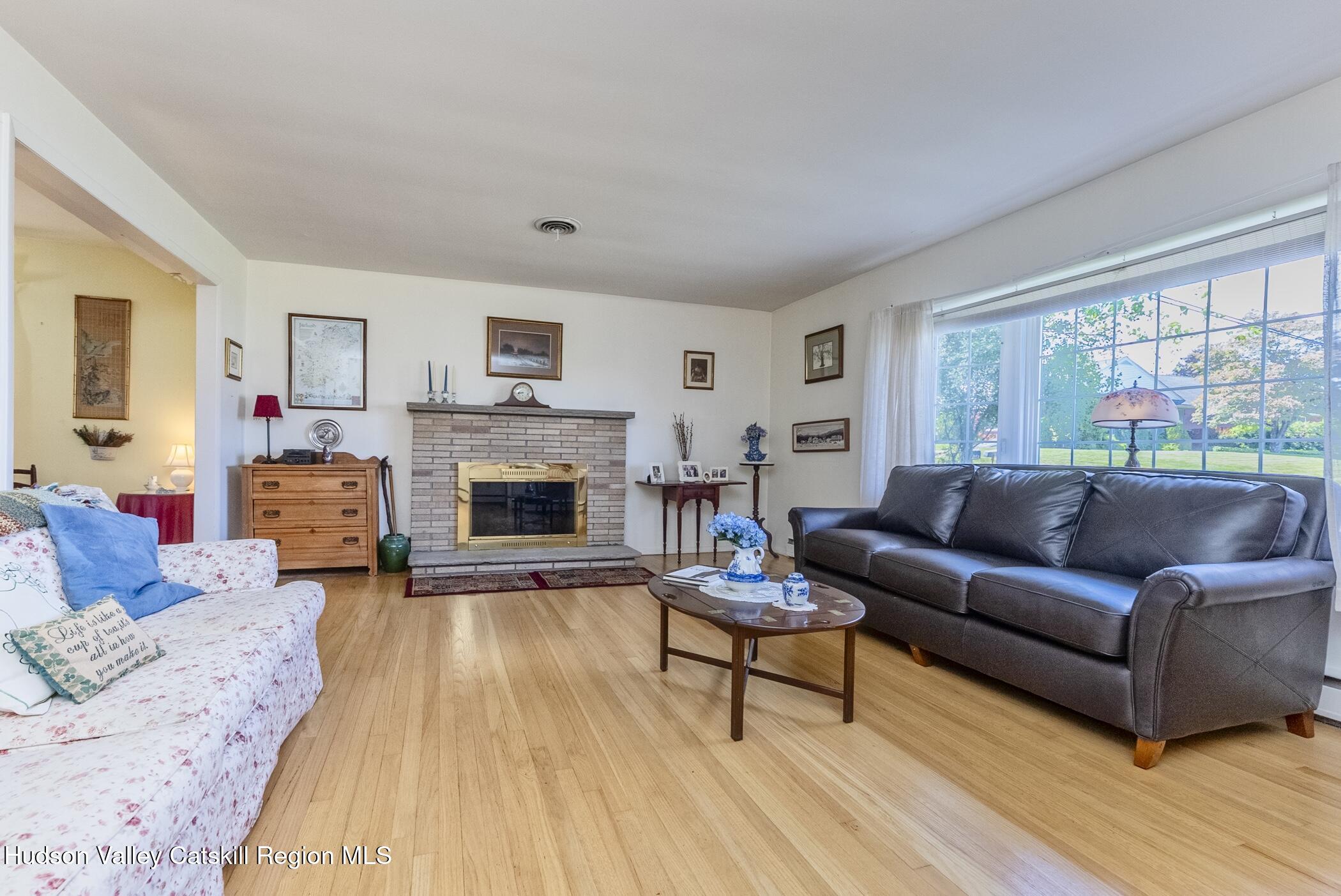 70 Ringtop Road Kingston, NY 12401 - Photo 5 of 47 a living room with furniture and a fireplace