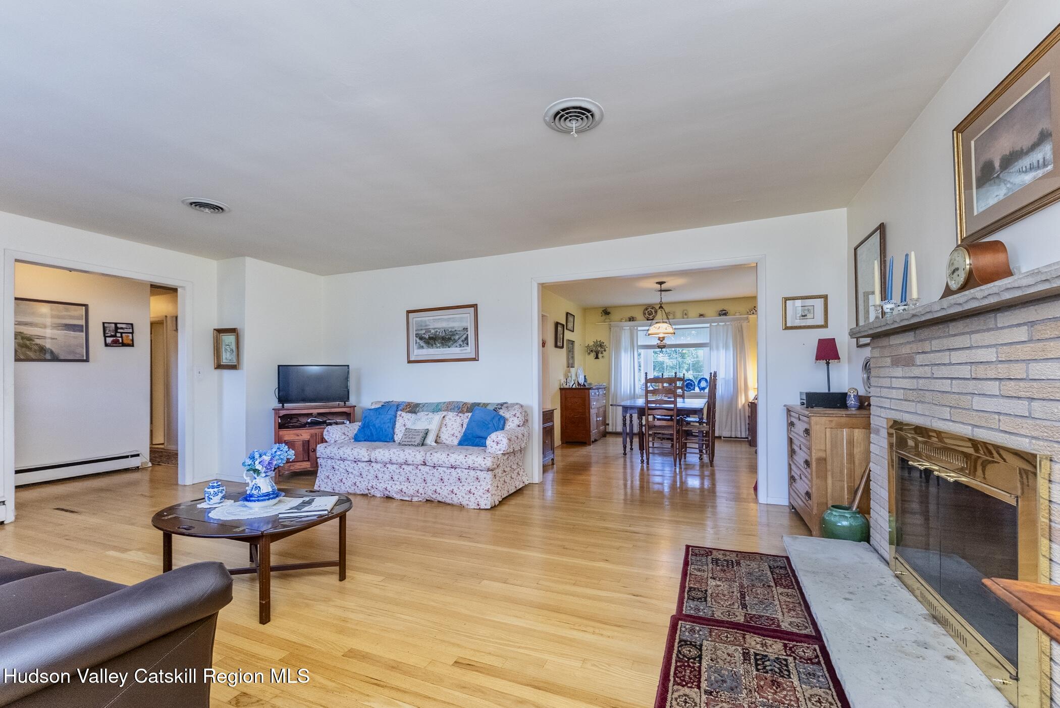 70 Ringtop Road Kingston, NY 12401 - Photo 6 of 47 a living room with furniture and a fireplace