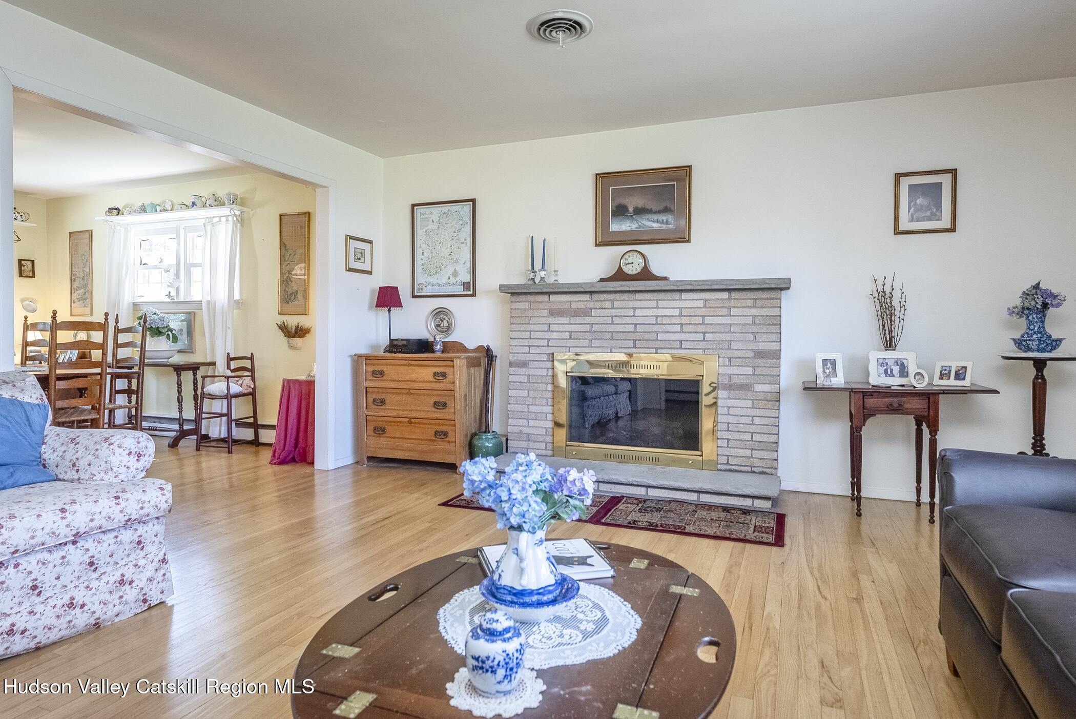 70 Ringtop Road Kingston, NY 12401 - Photo 8 of 47 a living room with furniture and a fireplace