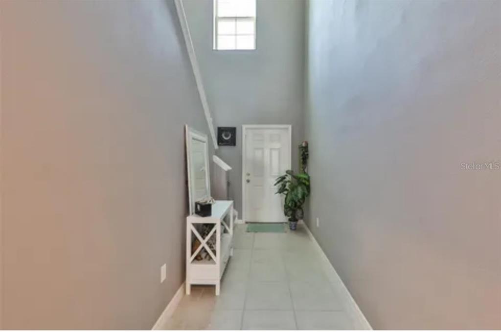 9317 Lemon Drop Loop Ruskin, FL 33573 - Photo 2 of 13 a view of entryway with livingroom