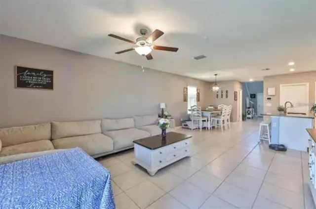 a living room with furniture and a view of living room
