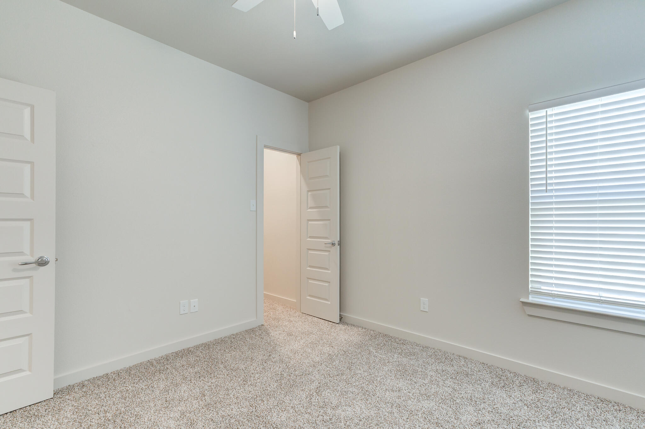 7044 41st Street Lubbock, TX 79407 - Photo 17 of 22 an empty room with windows