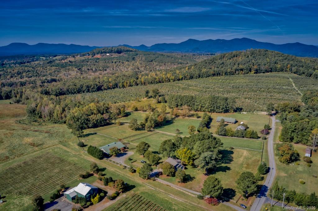 475 Gilbert Road Columbus, NC 28722 - Photo 11 of 45 an aerial view of a town with trees