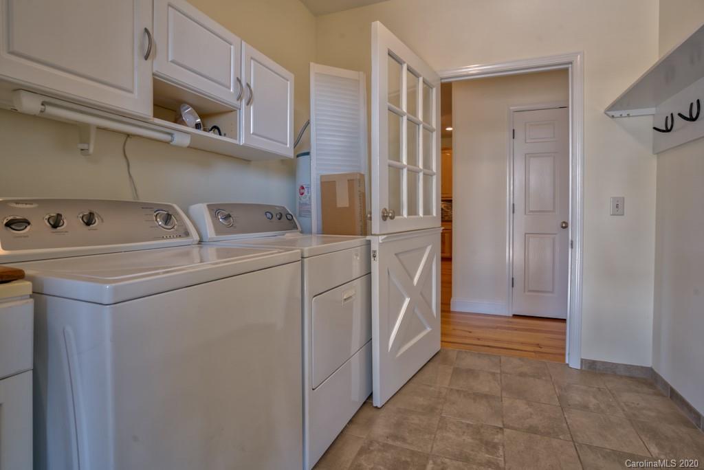 475 Gilbert Road Columbus, NC 28722 - Photo 13 of 45 a utility room with dryer and washer