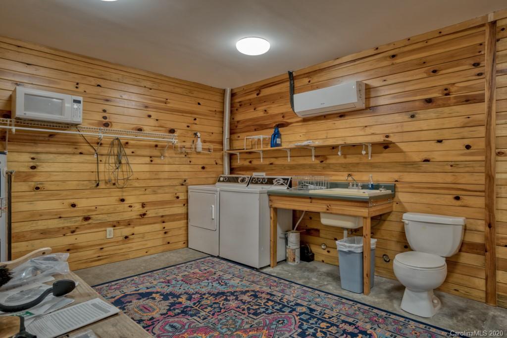 475 Gilbert Road Columbus, NC 28722 - Photo 39 of 45 a bathroom with a toilet and a shower