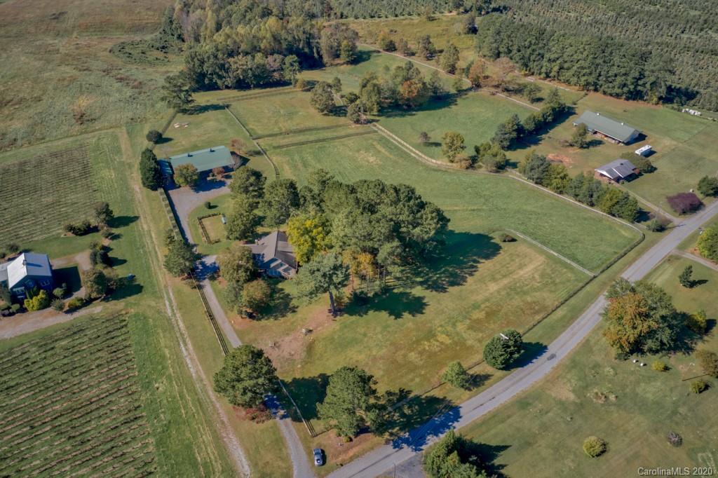475 Gilbert Road Columbus, NC 28722 - Photo 9 of 45 an aerial view of a house with a yard