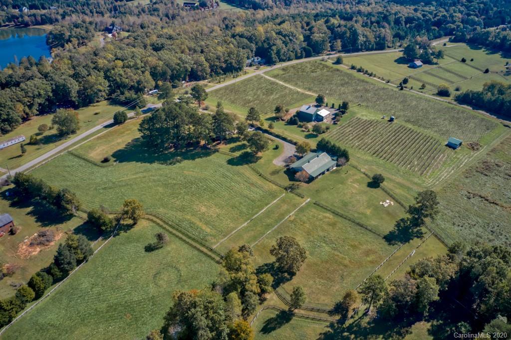 475 Gilbert Road Columbus, NC 28722 - Photo 10 of 45 an aerial view of a house with a yard