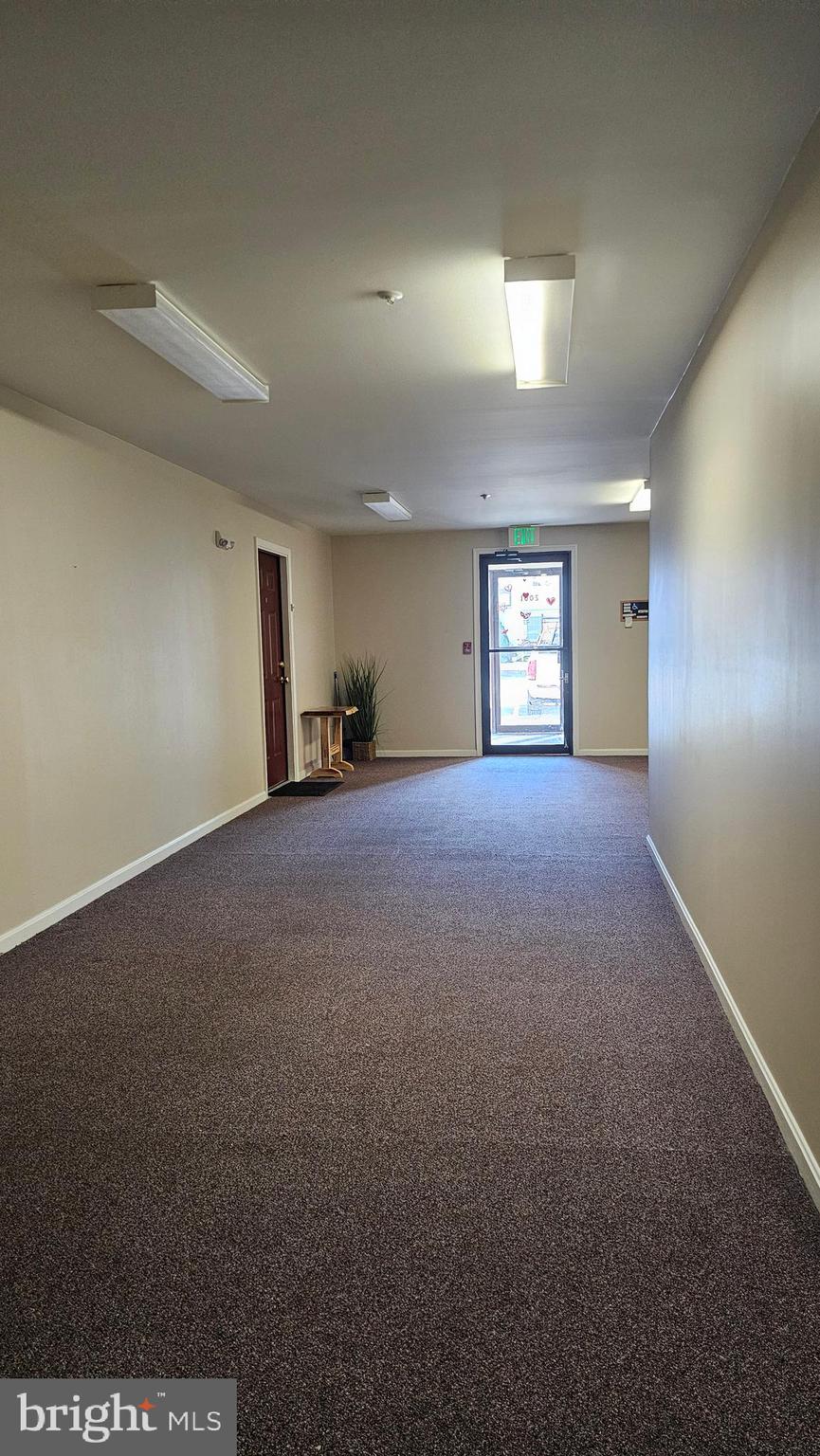 2001 Rudy Serra Drive, Unit 1B Sykesville, MD 21784 - Photo 23 of 27 Large Hall off Secure Vestibule