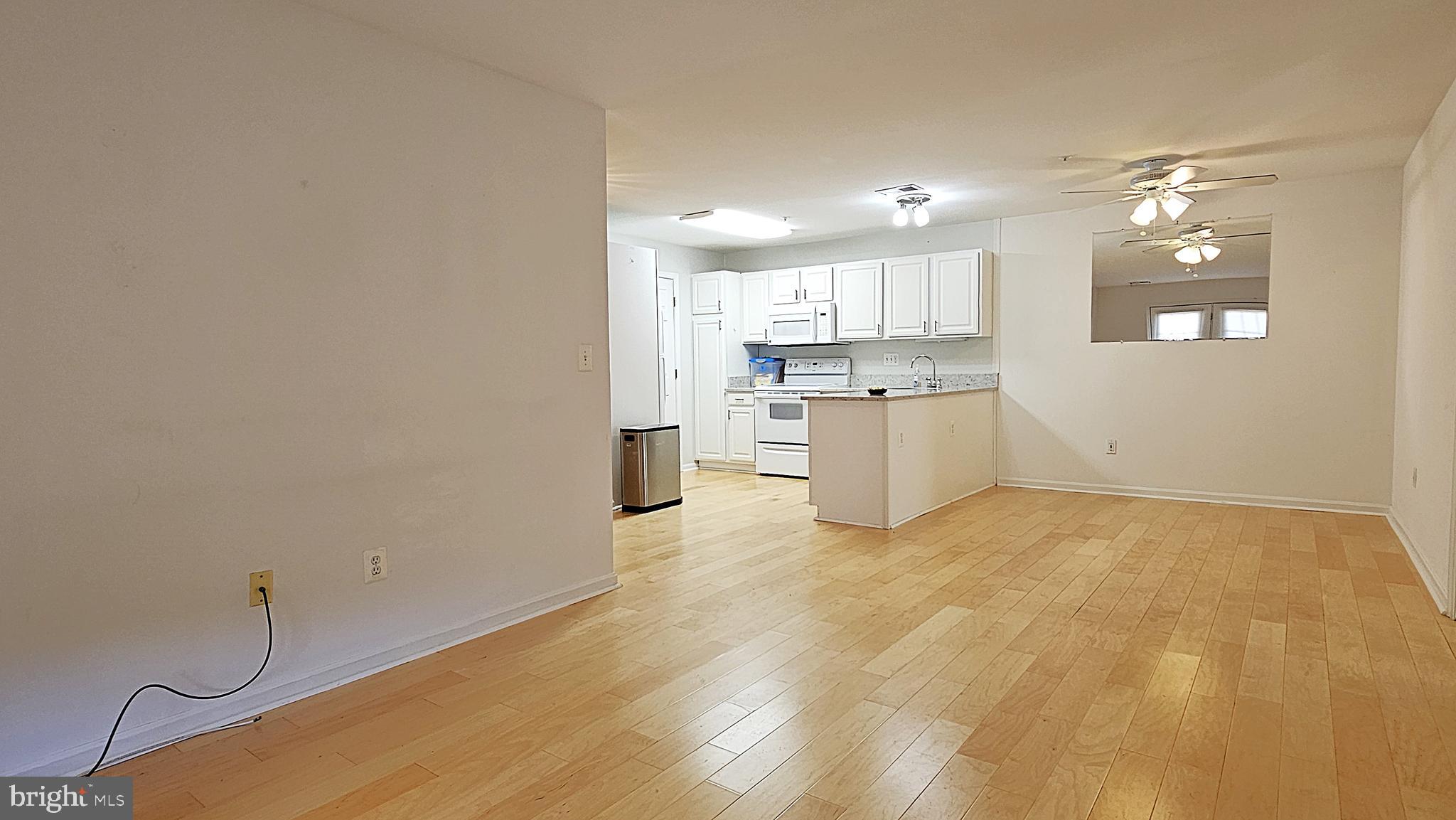 2001 Rudy Serra Drive, Unit 1B Sykesville, MD 21784 - Photo 7 of 27 Spacious Living/Dining Room Combo