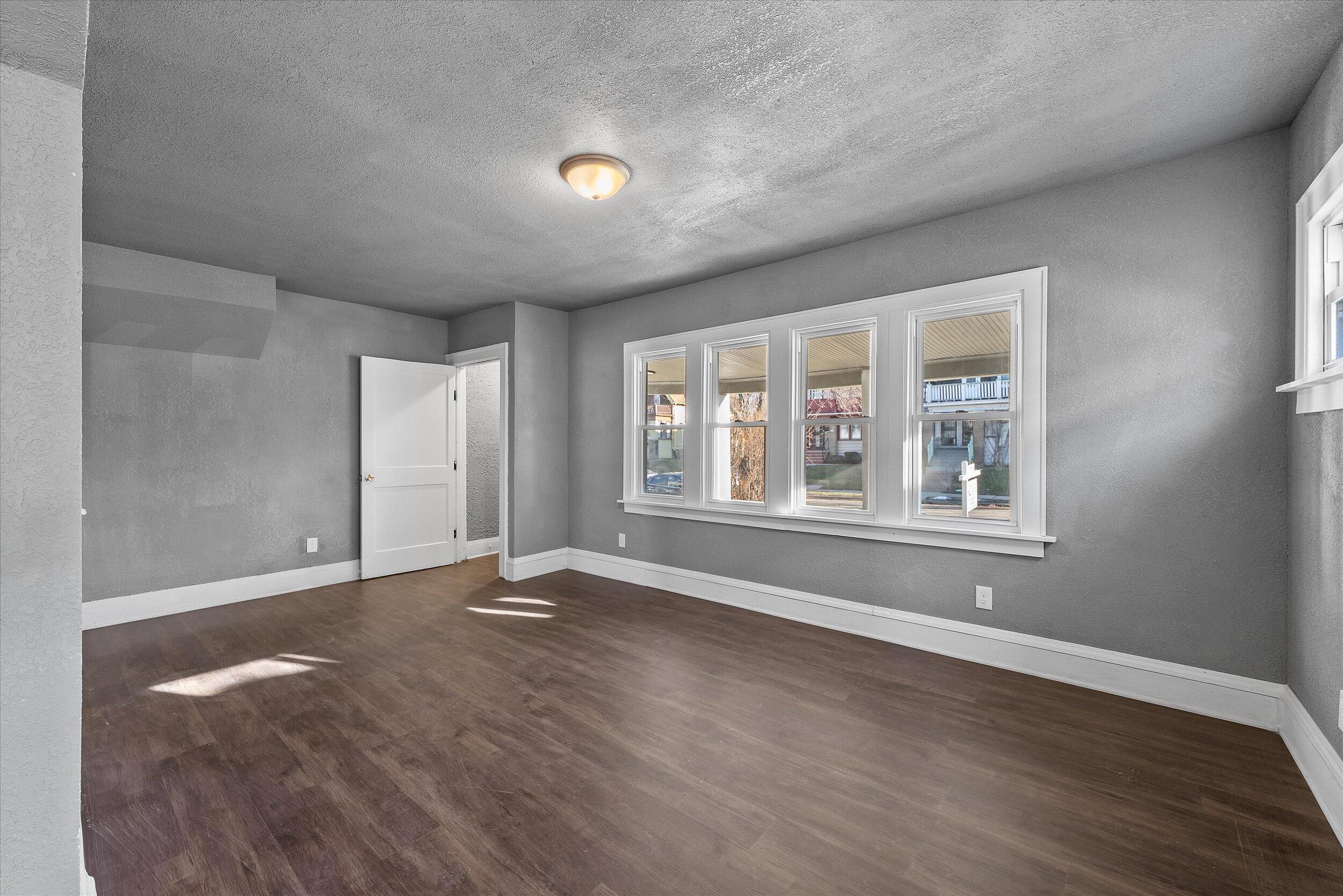 3905 North 13th Street, Unit 3907 Milwaukee, WI 53206 - Photo 3 of 44 03-Lower Living Room