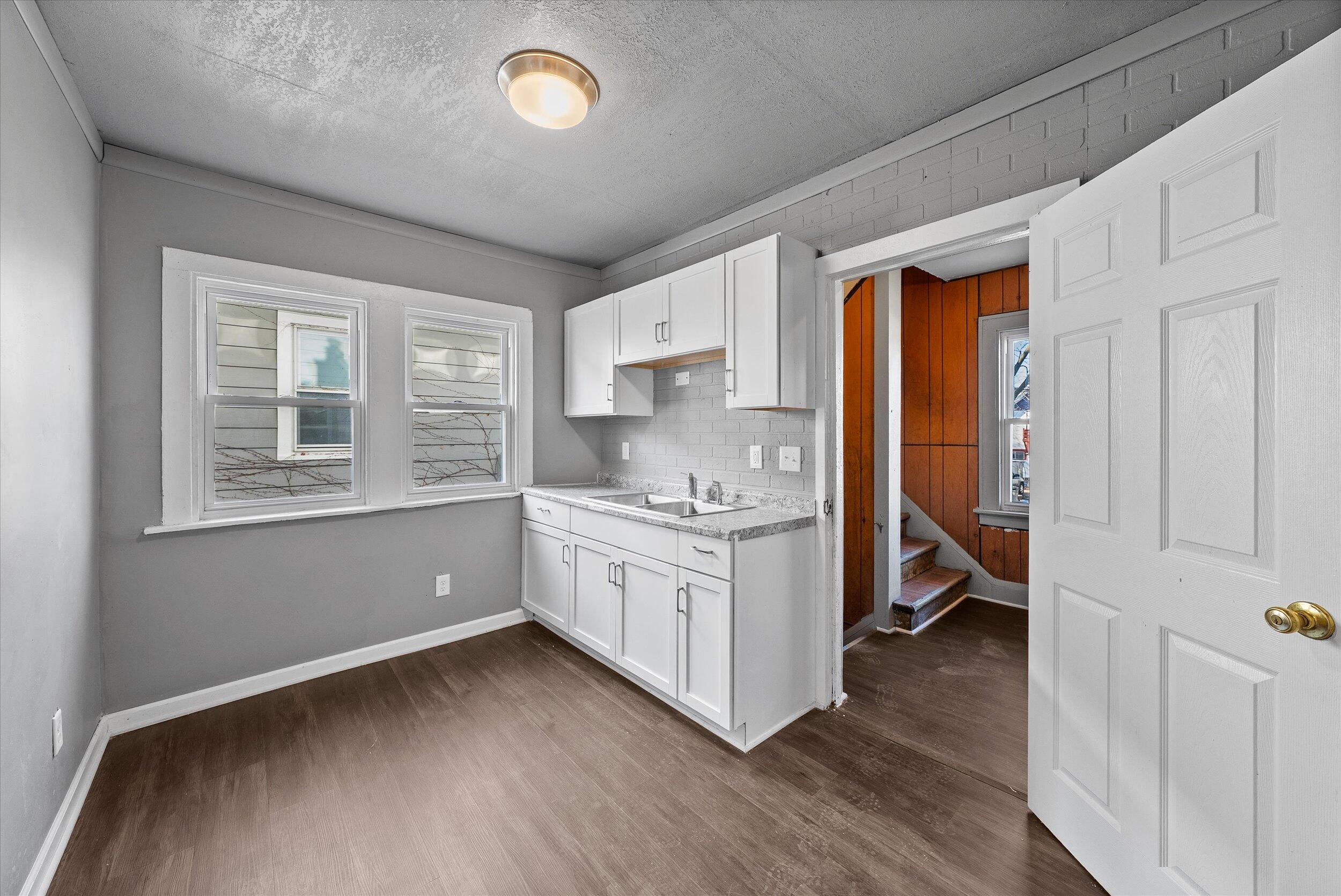 3905 North 13th Street, Unit 3907 Milwaukee, WI 53206 - Photo 7 of 44 07-Lower Kitchen
