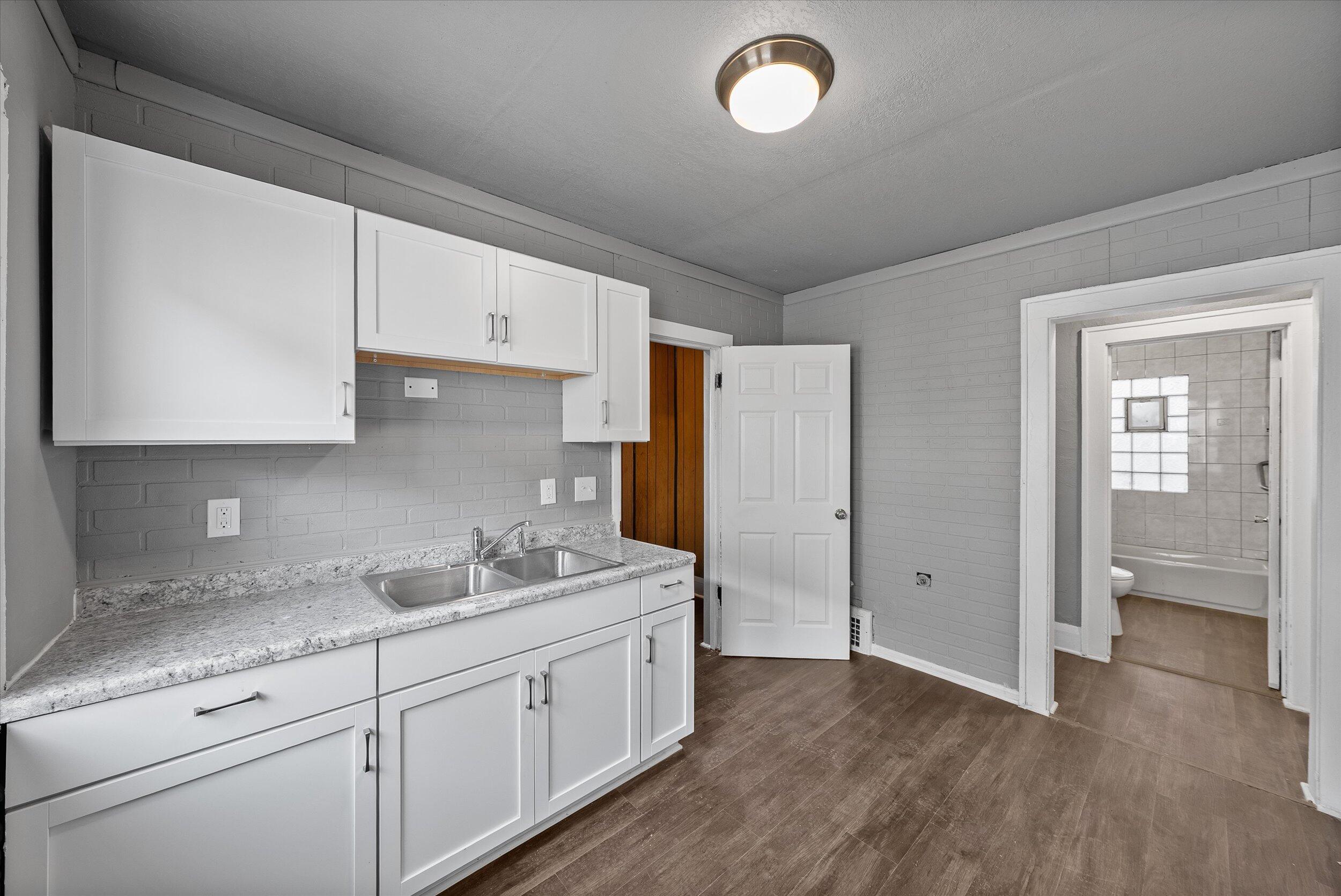 3905 North 13th Street, Unit 3907 Milwaukee, WI 53206 - Photo 8 of 44 08-Lower Kitchen