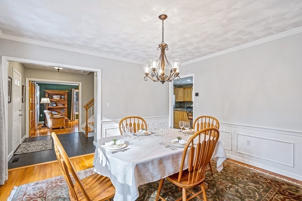 18 Ravens Bluff Andover, MA 01810 - Photo 14 of 41 a view of a dining room with furniture