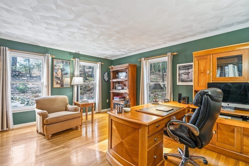 18 Ravens Bluff Andover, MA 01810 - Photo 15 of 41 a living room with furniture and floor to ceiling windows