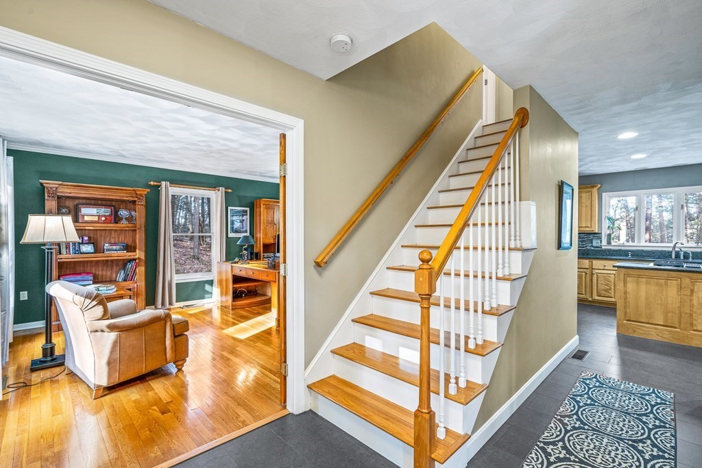 18 Ravens Bluff Andover, MA 01810 - Photo 2 of 41 workspace with wooden floor and windows