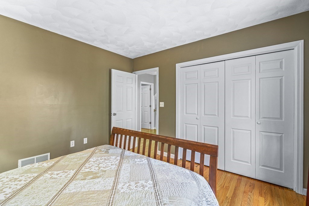 18 Ravens Bluff Andover, MA 01810 - Photo 26 of 41 a bedroom with a bed and a window