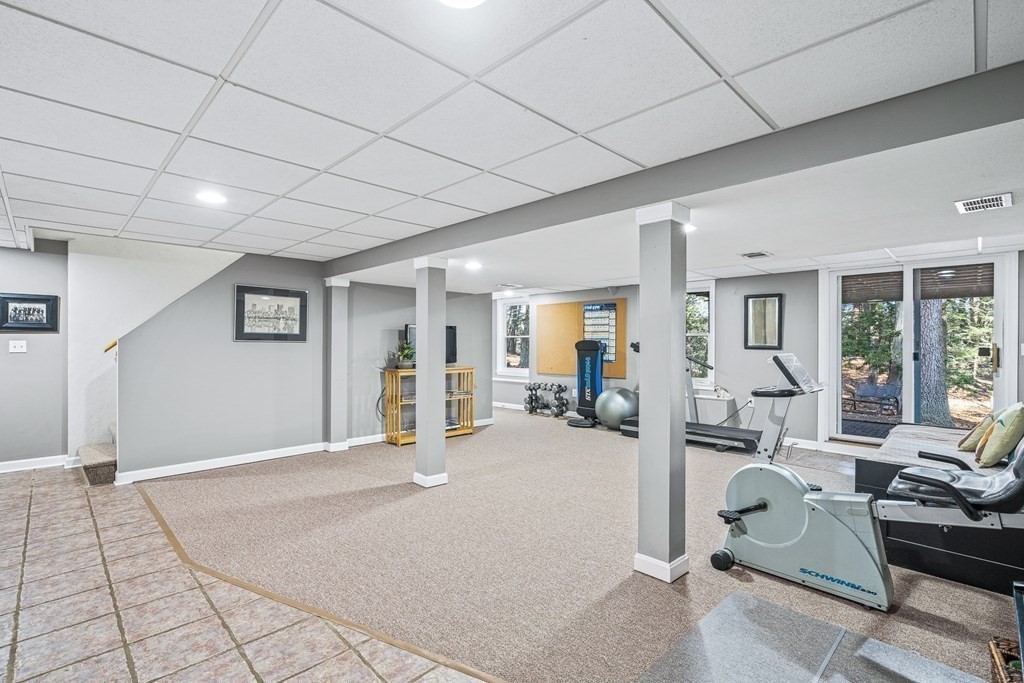 18 Ravens Bluff Andover, MA 01810 - Photo 32 of 41 a view of a livingroom with furniture and a rug