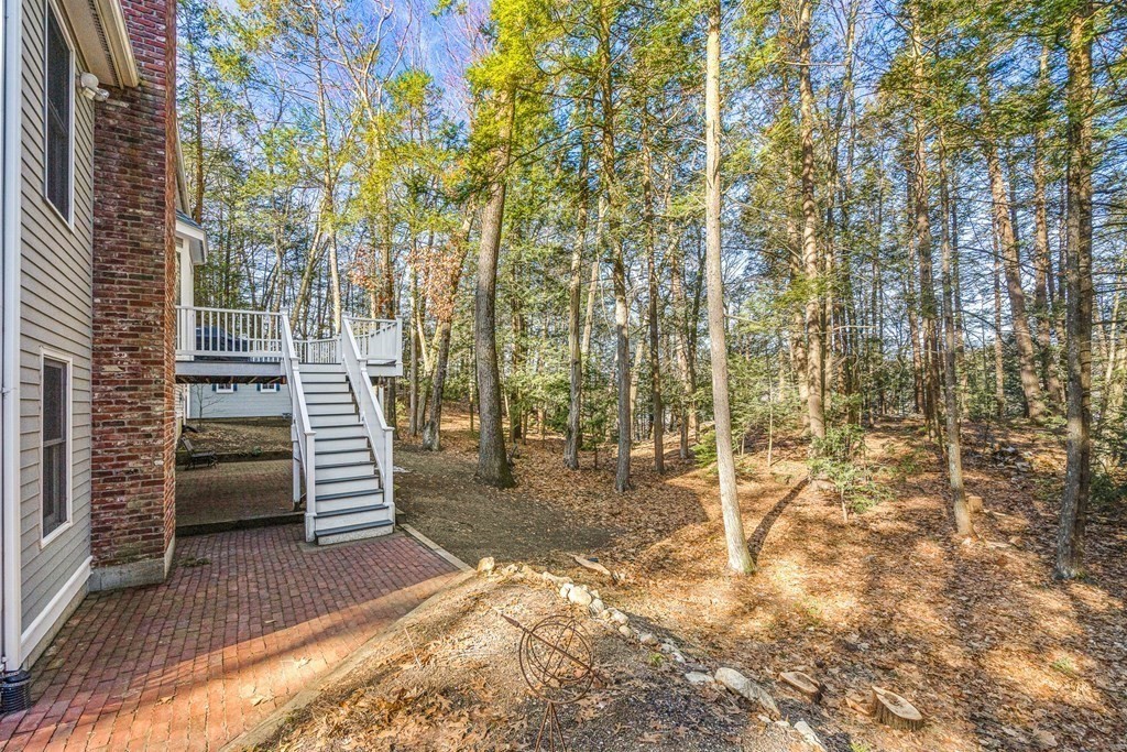 18 Ravens Bluff Andover, MA 01810 - Photo 36 of 41 a view of a pathway with a tree