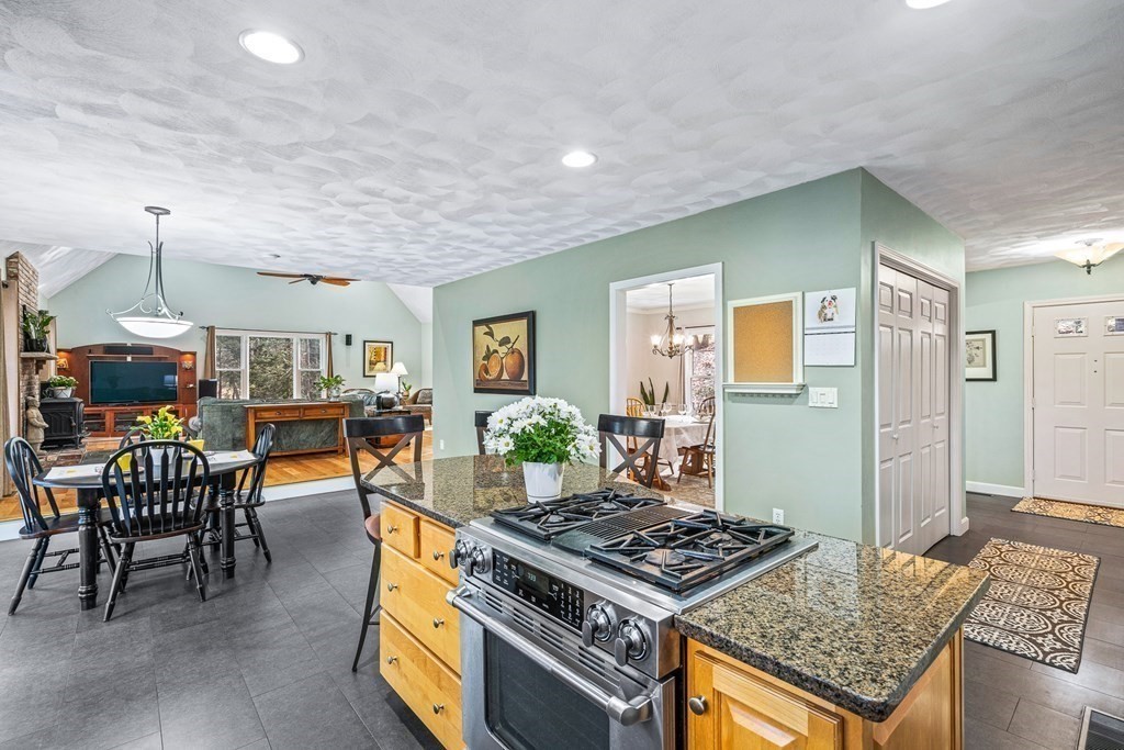 18 Ravens Bluff Andover, MA 01810 - Photo 6 of 41 a living room with furniture and a wooden floor