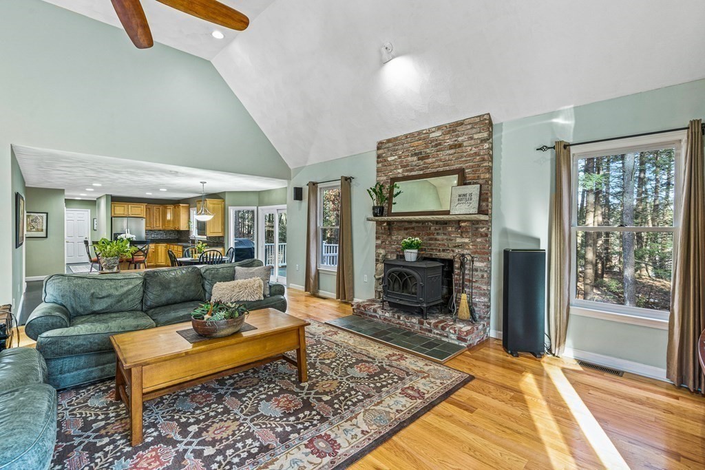 18 Ravens Bluff Andover, MA 01810 - Photo 10 of 41 a living room with furniture and a fireplace