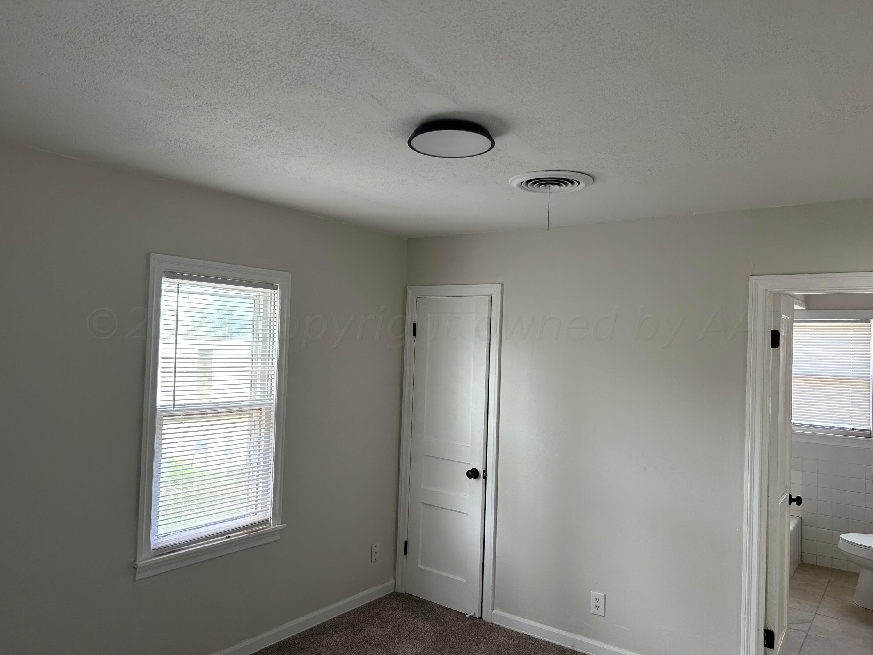 108 North Prospect Street Amarillo, TX 79106 - Photo 8 of 13 Bedroom showing window, closet & bath