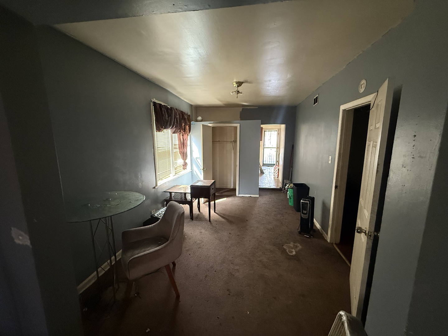 830 North Springfield Avenue Chicago, IL 60651 - Photo 13 of 31 a view of a livingroom with furniture and windows