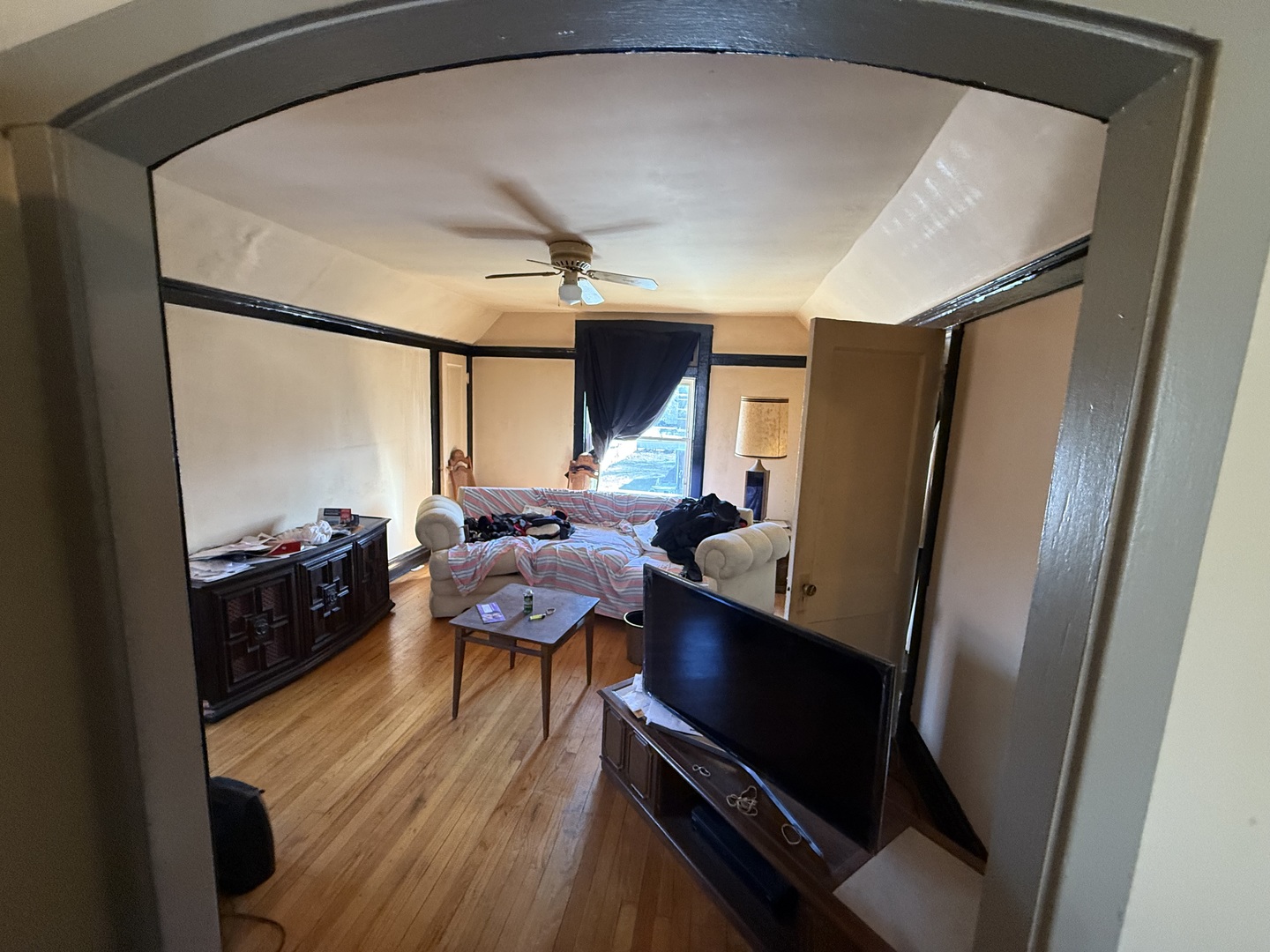 830 North Springfield Avenue Chicago, IL 60651 - Photo 26 of 31 a living room with furniture and a wooden floor