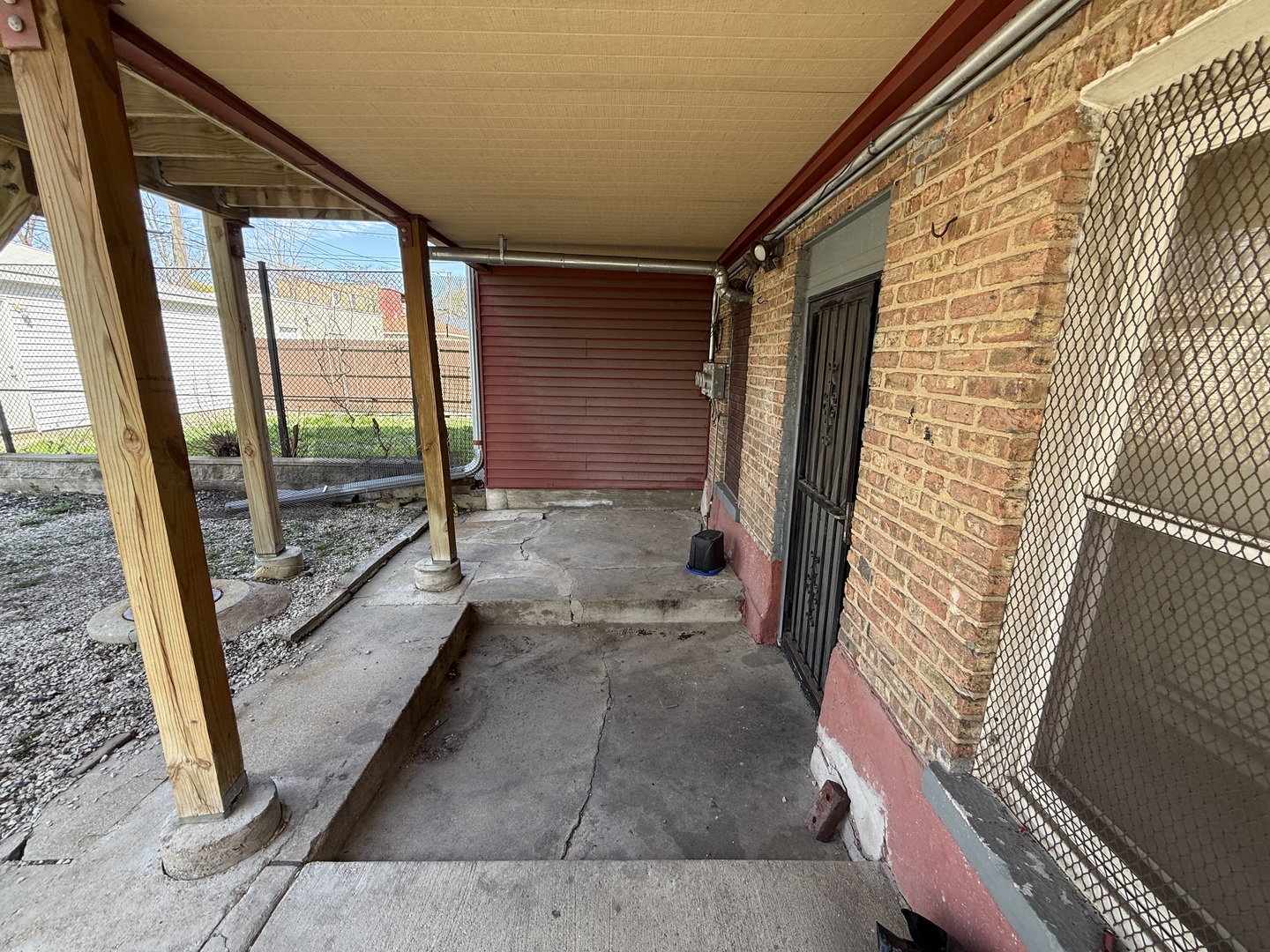 830 North Springfield Avenue Chicago, IL 60651 - Photo 6 of 31 a view of a porch