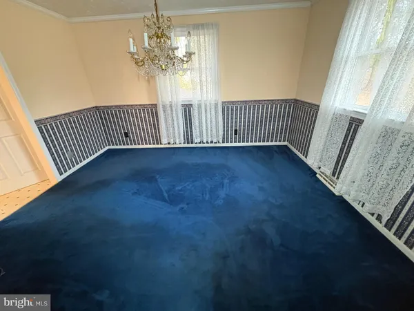 a bathroom with a toilet and a sink