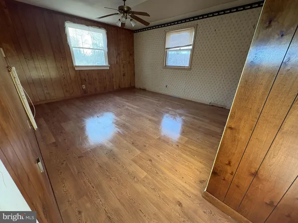 an empty room with windows