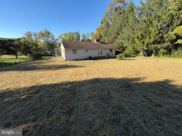 a view of a yard with an outdoor space