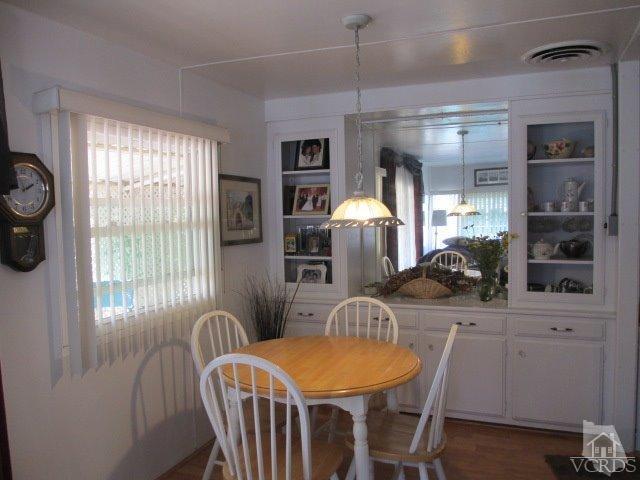 1225 South Rice Road, Unit 5 Ojai, CA 93023 - Photo 15 of 41 a view of a dining room with furniture and window