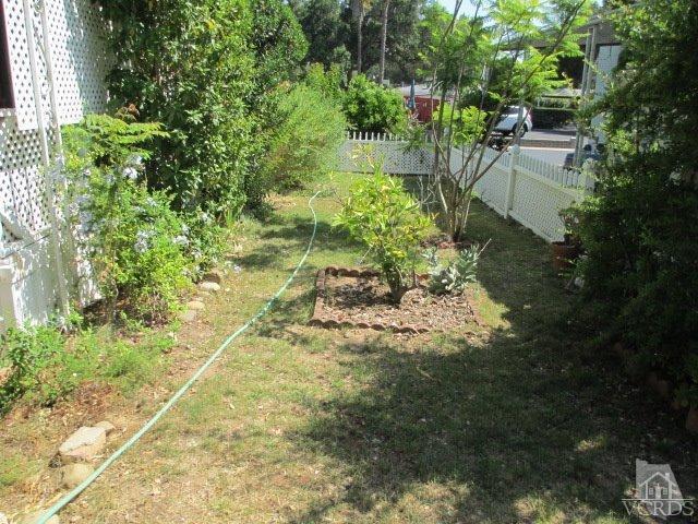 1225 South Rice Road, Unit 5 Ojai, CA 93023 - Photo 3 of 41 a backyard of a house with a yard and outdoor seating