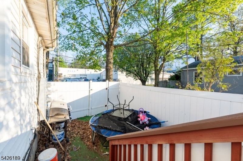47 River Road Chatham, NJ 07928 - Photo 19 of 21 a view of a chairs and table in the balcony