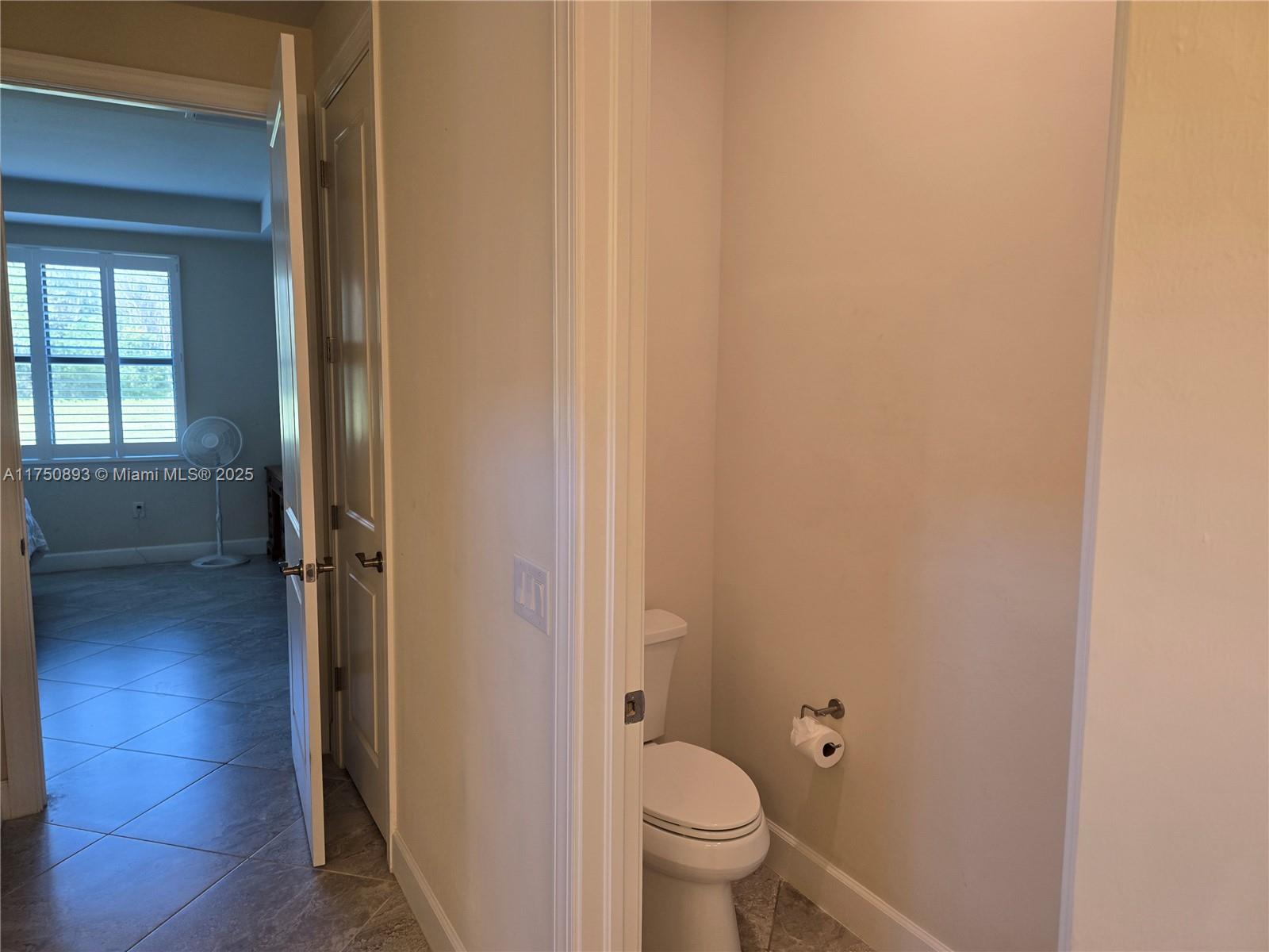 Ave Maria Immokalee, FL 34142 - Photo 13 of 21 a bathroom with a toilet and a shower