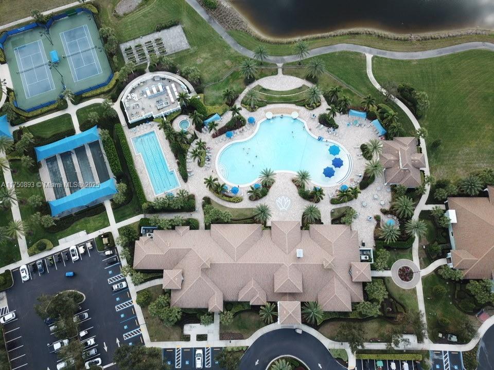 Ave Maria Immokalee, FL 34142 - Photo 20 of 21 an aerial view of a house with a swimming pool outdoor seating and yard
