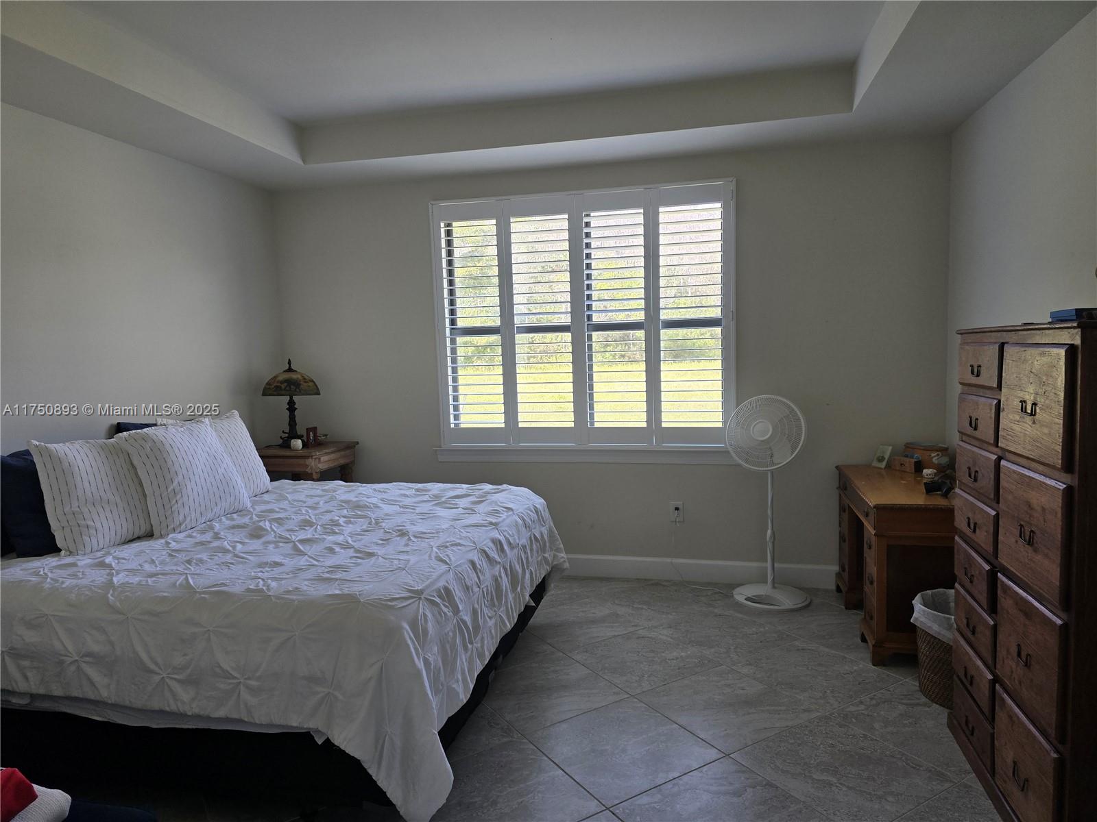 Ave Maria Immokalee, FL 34142 - Photo 10 of 21 a bedroom with a bed and a window