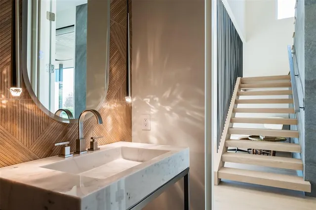 a kitchen with a sink and a refrigerator