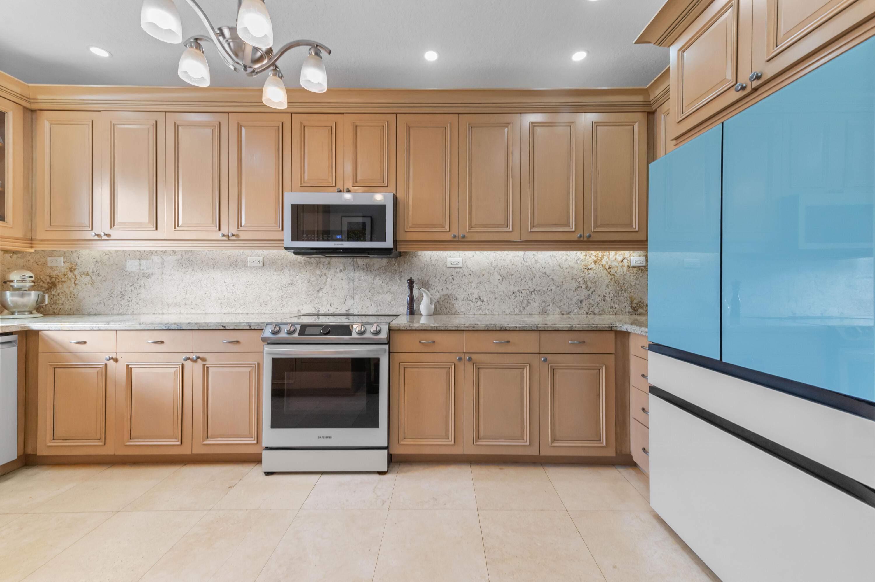 746 West Palmetto Park Road Boca Raton, FL 33486 - Photo 18 of 60 a kitchen with stainless steel appliances granite countertop a stove a sink and a microwave