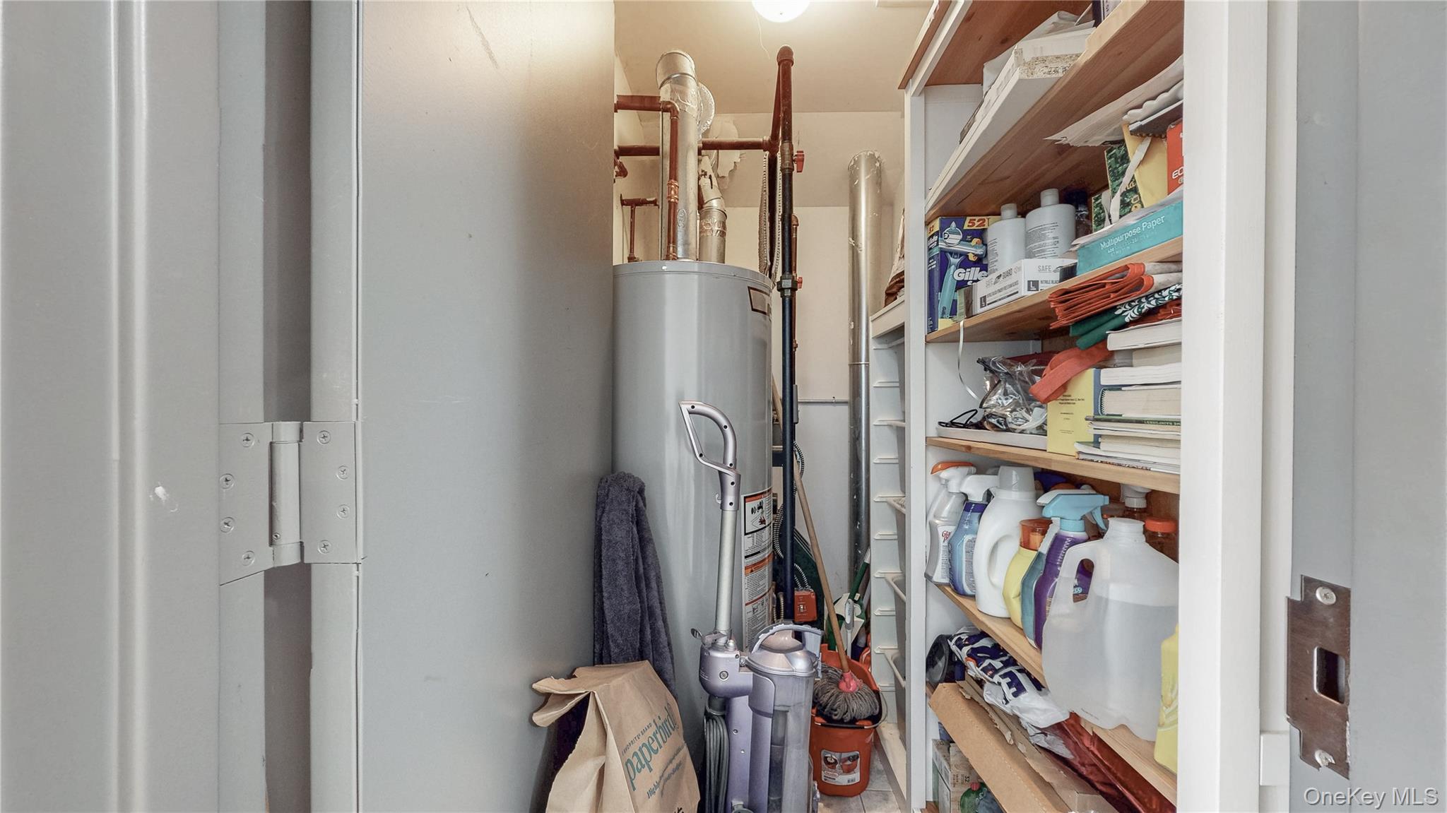 150-55 14th Road Queens, NY 11357 - Photo 14 of 39 a view of walk in closet with clothes