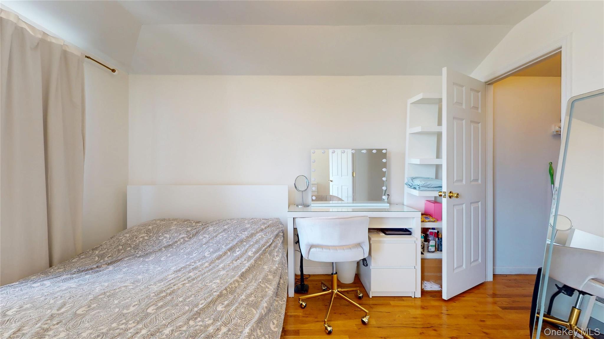 150-55 14th Road Queens, NY 11357 - Photo 23 of 39 a workspace with furniture and window