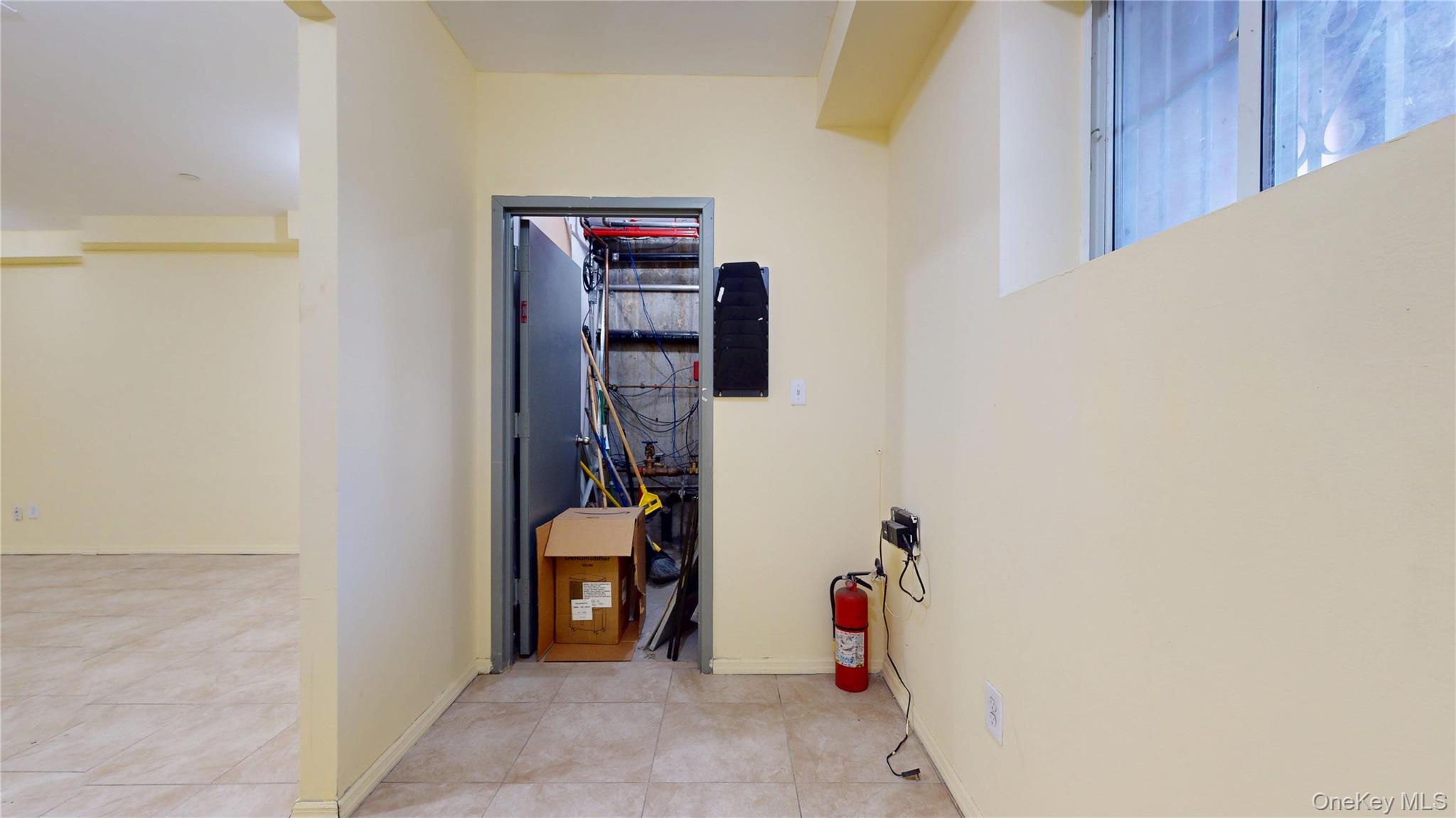 150-55 14th Road Queens, NY 11357 - Photo 25 of 39 a view of walk in closet with clothes and shoes