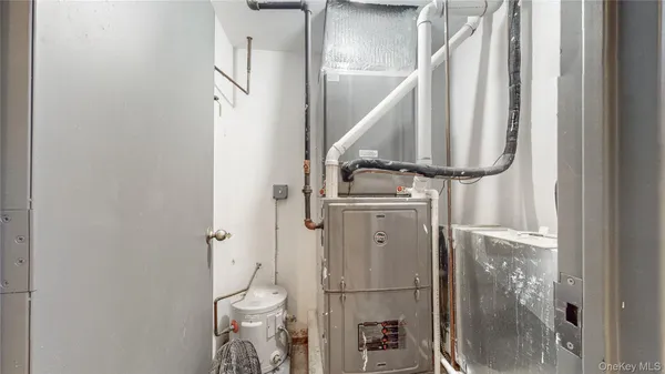 a bathroom with a granite countertop shower and a toilet